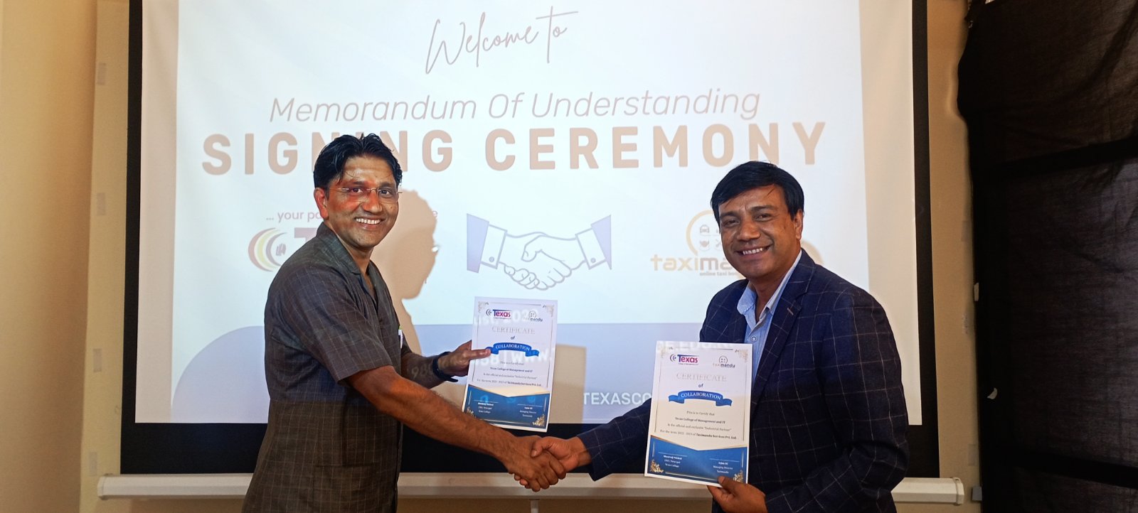 An MOU signing session between Taximandu & TCMIT