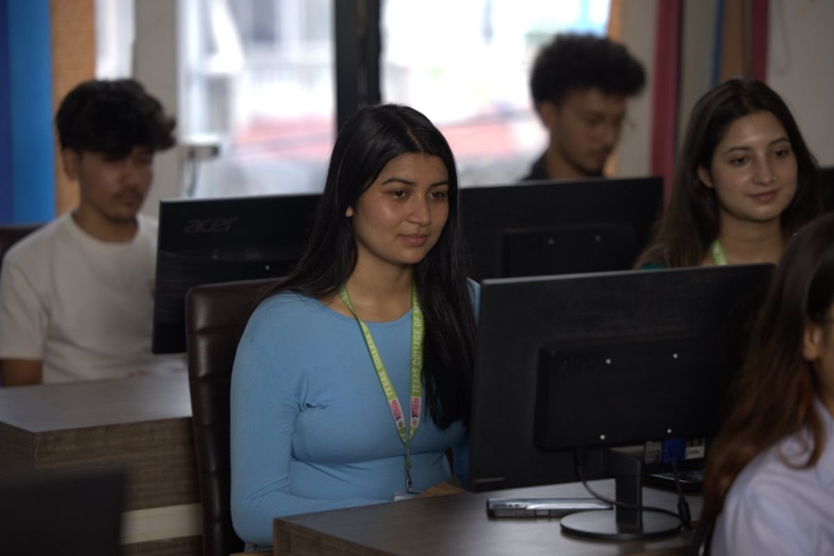 BIT degree students working in a computer lab at Texas College of Management and IT, Kathmandu